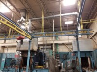 Utility room with a network of copper and PVC pipes