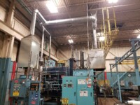 Industrial facility with a maze of steel pipes and connectors