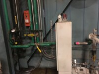 Mechanical infrastructure room with an array of pipes and valves