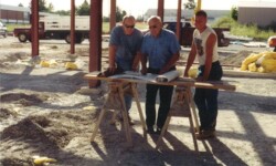 Andrew Heggemann with workers