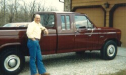 Andrew Heggemann in front of his pickup truck